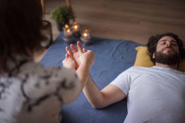 istock Man having palm massage and his finger stretched 1480641848