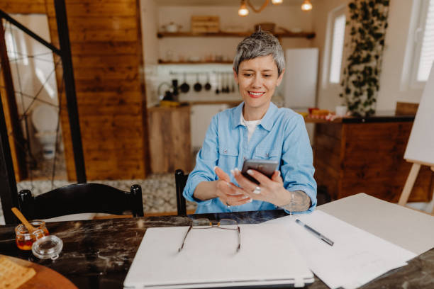 istock Senior woman using her smartphone 1480641898
