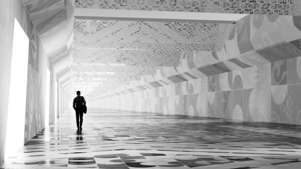 Man walking in futuristic corridor