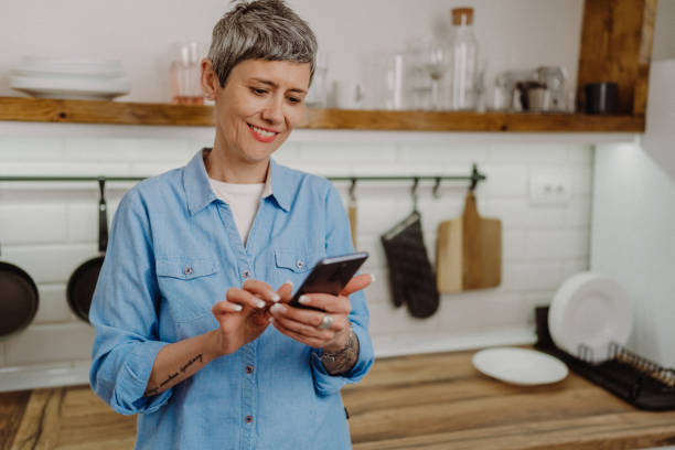 istock Senior woman using her smartphone 1480642678