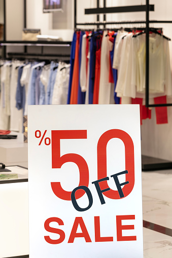Sale banner on shopping store entrance. stock photo.