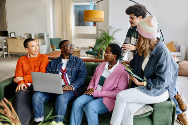 istock Group of young coworkers talking in the modern office 1480646502