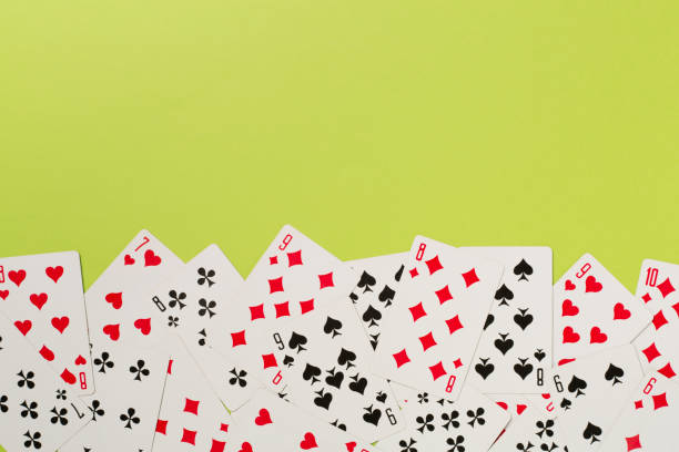 istock Playing cards on color background. Gambling concept. Top view 1480648257