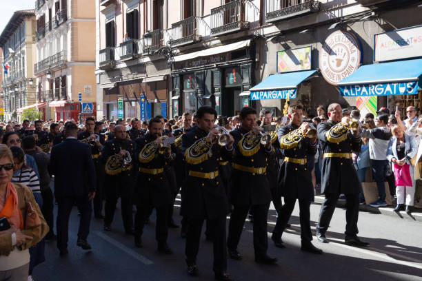 Madrid, Spain; April 2, 2023: Holy Week Procession on Palm Sunday. Ceremonially dressed brass band