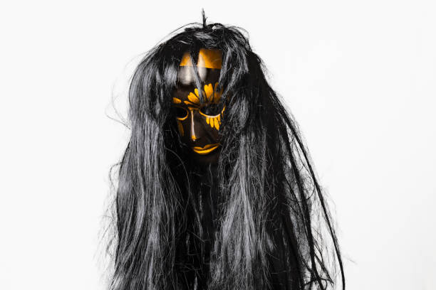 istock Scary mask with black hair and scary face on white background 1480652400