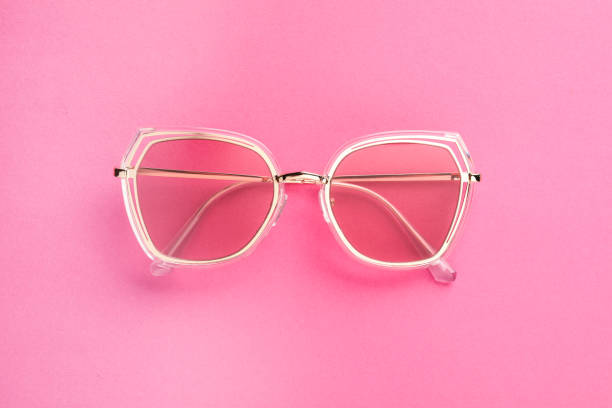 istock New stylish sunglasses on pink background, top view 1480657565