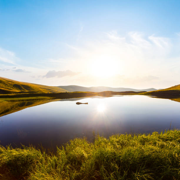 istock small quiet mountain lake at the sunrise 1480665801