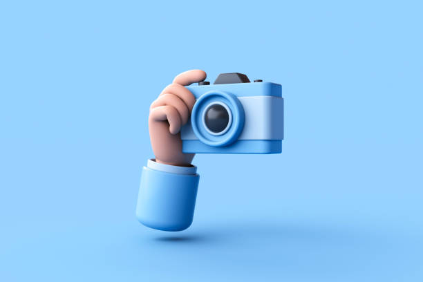 青の背景にカメラを持ち、写真を撮る手の3Dレンダリング。