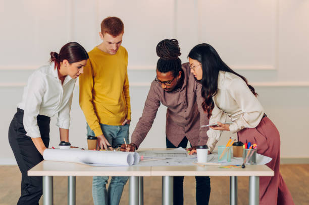 istock Diverse group of engineers or architects having a meeting in an office 1480677833