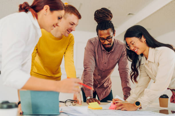 istock Multiracial team of engineers or architects having a meeting in an office 1480677837