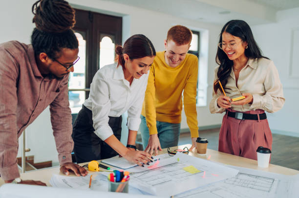 istock Multiracial team of engineers or architects having a meeting in an office 1480677838