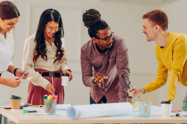 istock Diverse group of engineers or architects having a meeting in an office 1480677842