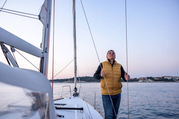 istock Caucasian Man Standing On A Deck Of A Yacht 1480678082