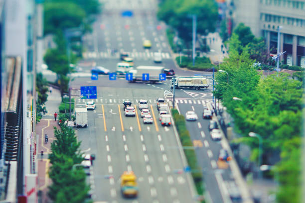 istock car driving on city road 1480682361