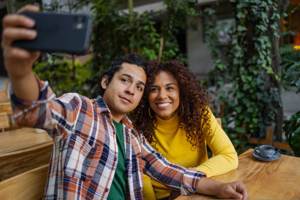 istock Young couple outdoors taking a selfie 1480684323