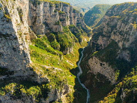 Aerial view of Vikos Gorge, a gorge in the Pindus Mountains of northern Greece, lying on the southern slopes of Mount Tymfi, one of the deepest gorges in the world. Zagori region, Greece.
