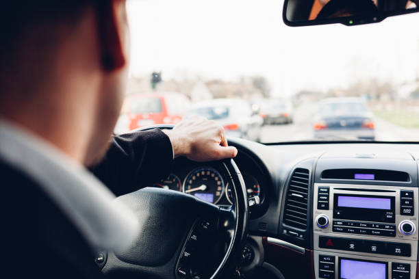istock Man driving car. Traffic jam. 1480691504
