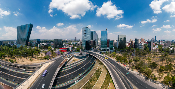 Petroleos fountain and roundabout in the morning, Mexico City, aerial view. Intersection of Reforma Avenue and Periférico Boulevard