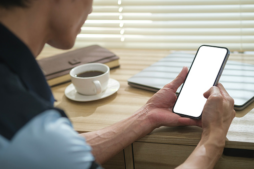 Using Phones In House Close Up View Young Man Hands Using Smart Phone While Sitting In Home ...