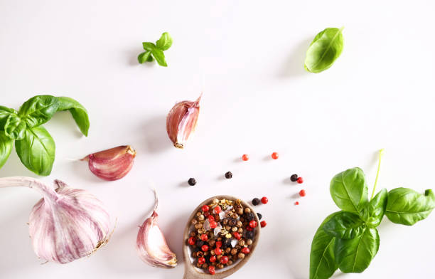 istock food background with fresh garlic herbs on white background 1480708642