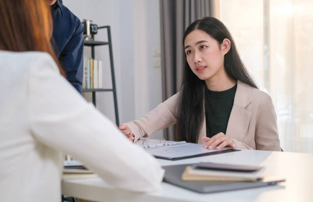 istock Focused professional business team working together discuss paperwork corporate plan at meeting table. 1480709952