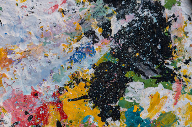 istock Colorful paint splatter shot from above 1480713442