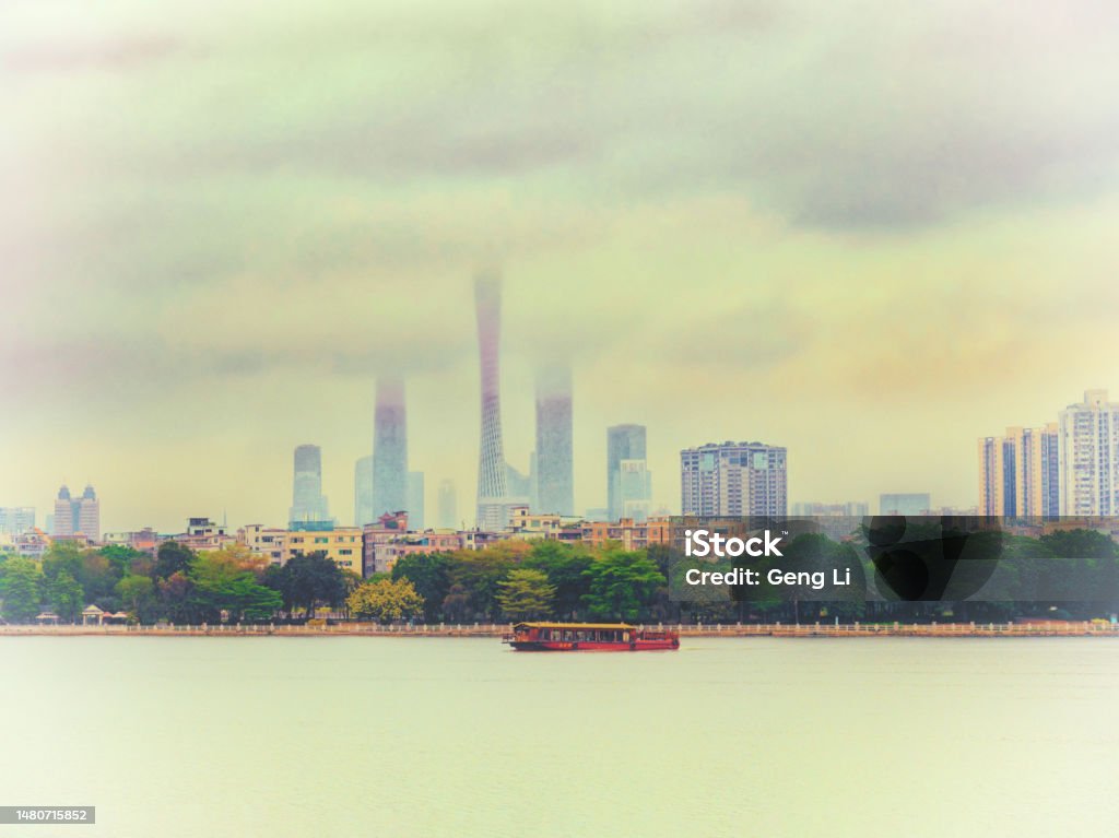 Canton Cityscape view from Haizhu Lake Park Haizhu Lake Park is just in line with Guangzhou Tower and Sports Center. Canton Tower Stock Photo