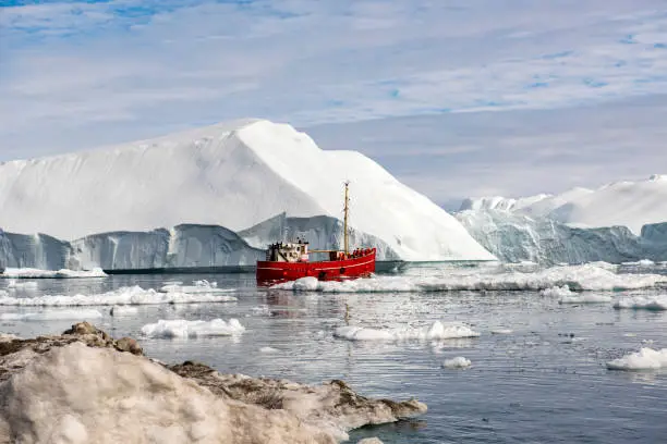 Photo of Ice Berg with Fishing Vessel