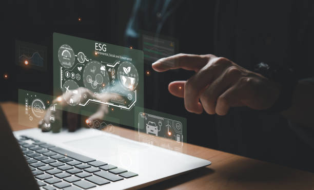 istock Entrepreneur hand point at ESG digital screen dashboard while control and reduce carbon emission for global friendly business. Business with environment concern, carbon credit and zero emission. 1480719917