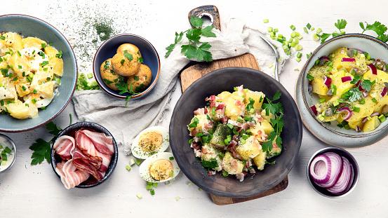 Set with different potato salads. Traditional german and american cuisine. Top view