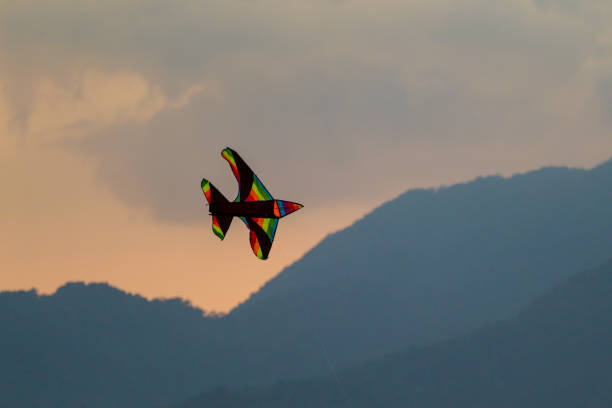 istock Kite Flying By Sea Against Sky During Sunset 1480721347
