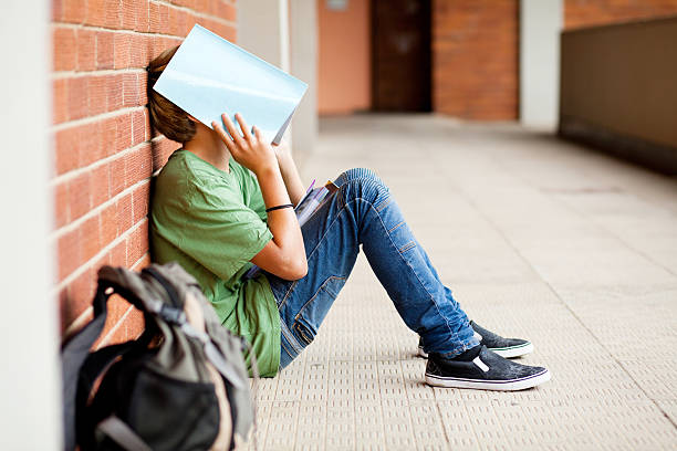 tired high school student stock photo