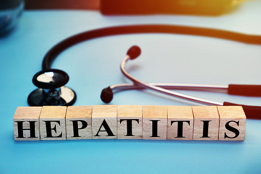 Hepatitis, text words typography written with wooden letter, health and medical concept