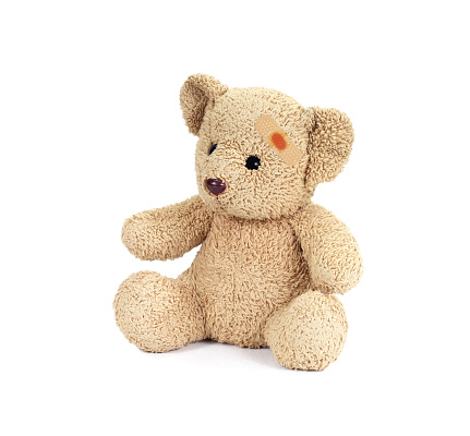 a childs cuddly Teddy Bear, no branding showing, isolated and cut out on a white background with copy space.