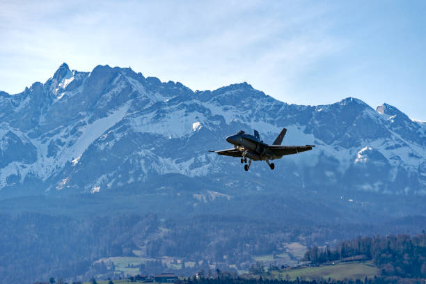 fighter plane of swiss air force approaching airbase. - wheel airplane landing air vehicle imagens e fotografias de stock