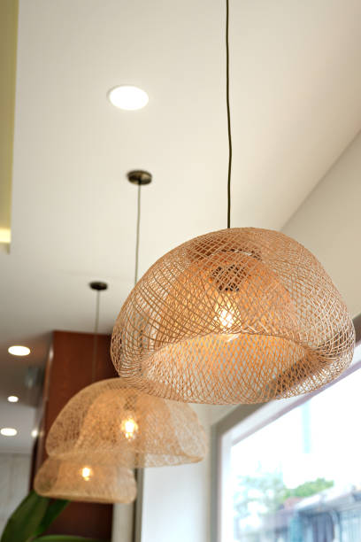 istock Wicker Pendant Lamp, rattan ceiling pendant lamp hangs on ceiling. 1480728783