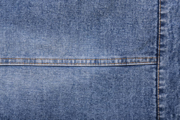 istock Blue jeans background and texture close up.Denim seam. 1480728807