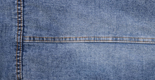 istock Blue jeans background and texture close up.Denim seam. 1480728863