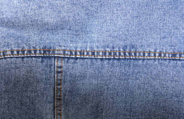 istock Blue jeans background and texture close up.Denim seam. 1480728946