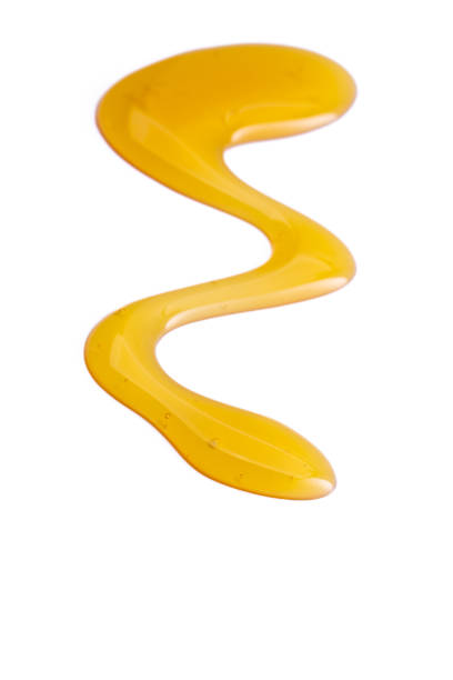istock Honey drop on the white background 1480729036