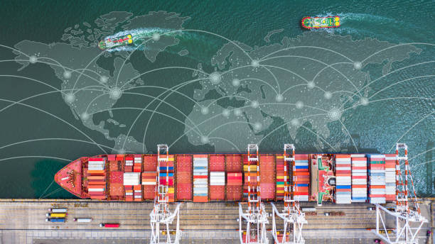 istock Container ship  loading in a port, Aerial top view container ship in business import export transportation logistic. 1480729102