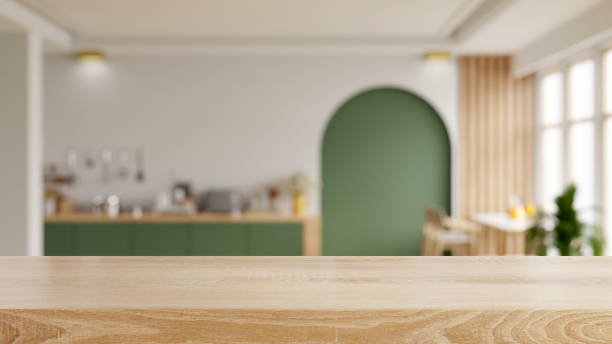 istock Wooden table top on blur kitchen room background,Modern Contemporary kitchen room interior. 1480731132