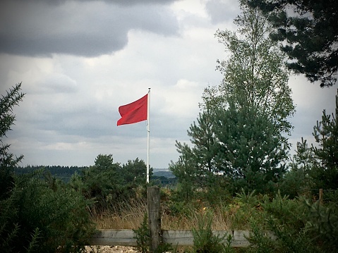 Red flag flying at firing range