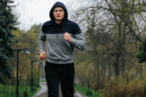 istock Outdoor Exercise Young Male Runner Braving the Elements 1480735954