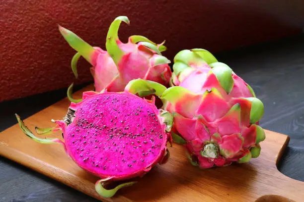Photo of Amazing Red Peel and Flesh Dragon Fruits also Called Pink Pitaya or Strawberry Pear