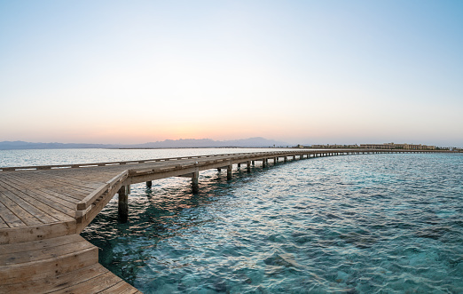 Panoramic view of Soma bay famous wooden water jetty by sunset