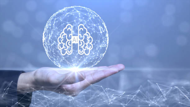 istock The concept of artificial intelligence technology or AI.
There is an abstract brain circuit within a sphere formed by interconnected polygons, placed on a hand against a blue background. 1480746311