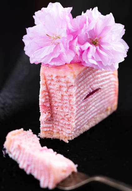 Sakura Crepe Cake Sakura Crepe Cake with Sakura Flower mochi cherry blossom cake stock pictures, royalty-free photos & images