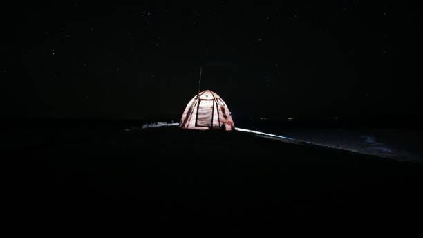 istock A tent with a stove stands under the starry sky. 1480749551
