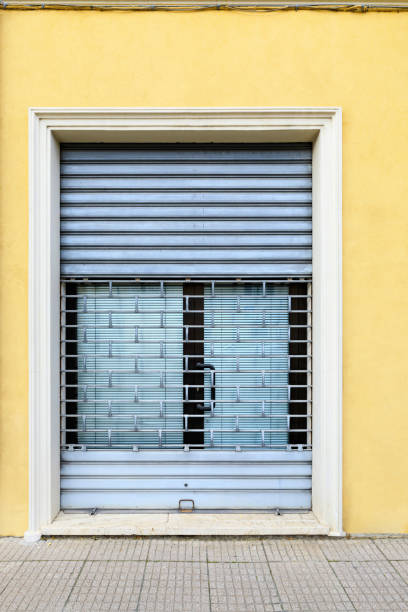 istock Yellow building, closed shop 1480750537